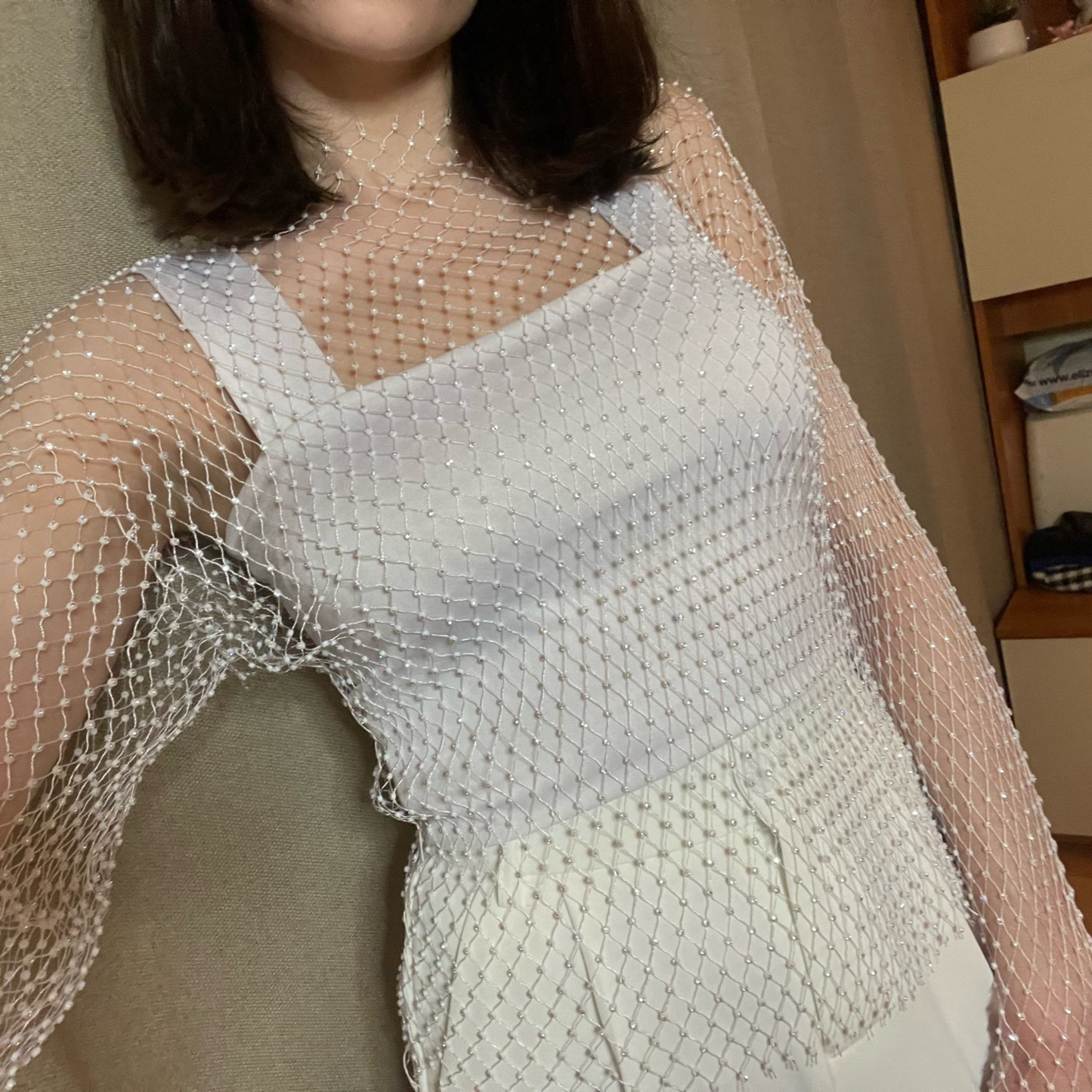 customer wearing  Rhinestone Mesh Top with top underneath and pants